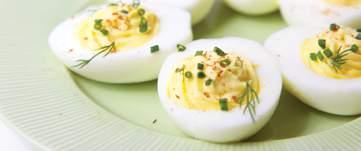 Recipes Deviled Eggs INGREDIENTS 12 hard-boiled eggs, cooled ⅓ cup mayonnaise ¼ cup Dijon-style mustard ¼ tsp salt paprika, chives, and dill, to garnish DIRECTIONS Peel the eggs and cut in half