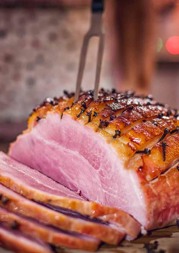 Asian Baked Ham PORTIONS 10 COOKING TIME 45 MINUTES 2-3kg leg of ham, skin removed 340g brown sugar 1 tbsp black peppercorns 1 knob ginger, peeled and grated 50g whole cloves 3 star anise 3 garlic
