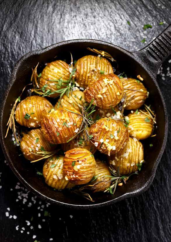 Hasselback Potatoes PORTIONS 8 COOKING TIME 40/45 MINUTES 12 pontiac potatoes, peeled 60ml olive oil 3 teaspoons rosemary leaves fresh (few spring extra) 2 garlic cloves, finely chopped or grate 1.