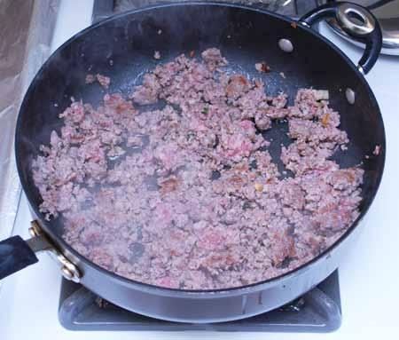 11 7 Finally, cook the pork sausage meat, breaking it up with a spatula, until thoroughly cooked and lightly browned.