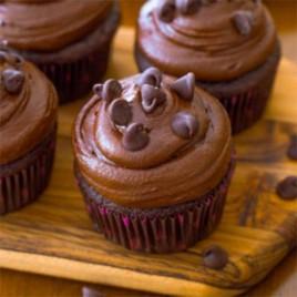 Death by chocolate cupcakes Dark chocolate cupcakes topped with dark chocolate frosting. Chocolate lovers only!