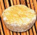 Like Camembert, it claims to be a soft-ripened variety, but like Pont l'evêque, its predominantly red rind has only a dusting of white mold.