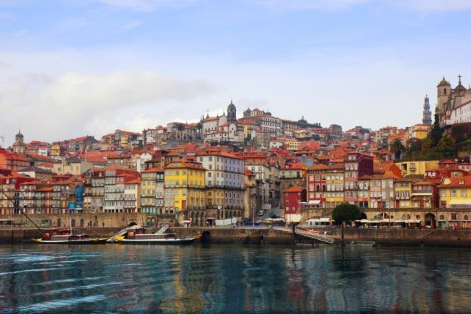 THE OLD AND THE NEW WINES FROM THE DOURO PORT: OPORTO, PORTUGAL OPORTO'S WATERFRONT DISTRICT Since the 18th century, the city of Oporto has been synonymous with the production of Port, a longaging,