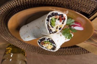 Raisin Chicken Wrap A knife ½ cup jalapeno or vegetable light cream cheese spread 4 soft taco size tortillas ¼ cup pineapple or mild traditional salsa 1 cup Sun-Maid Natural Raisins 1 package (6 oz.