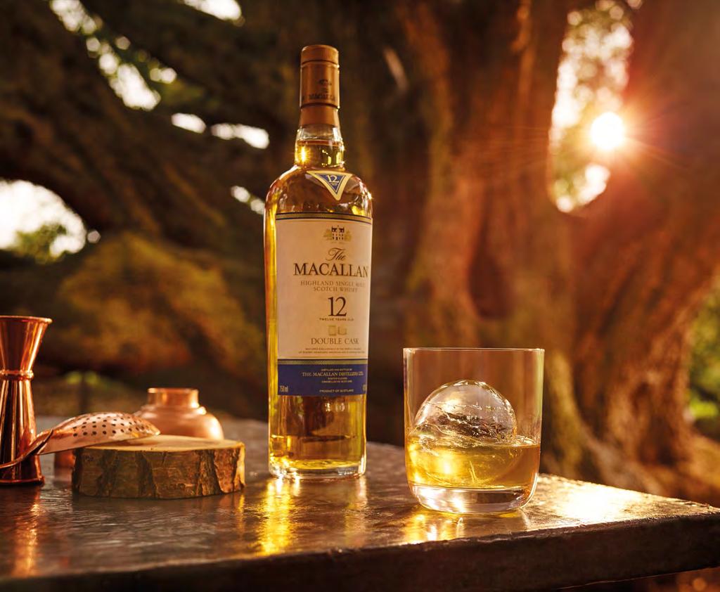 33 Perfect Serve The Macallan 12 Years Old Double Cask Pouring The Macallan 12 Years Old Double Cask over a crystal clear ice ball perfectly chills the whisky.