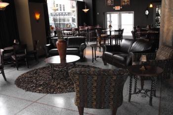 3779 The Black & Tan Grille includes a first floor expanded lounge and bar area that is cozy yet very
