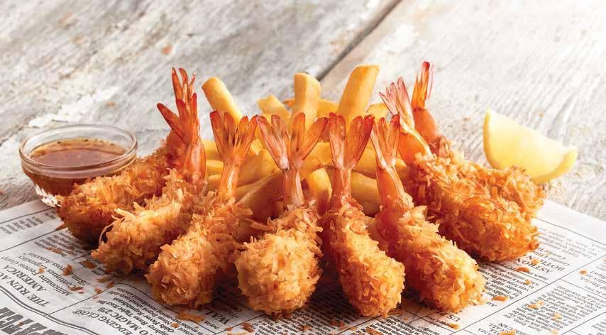 29 Dumb Luck Coconut Shrimp Bubba always loved this one! Hand dipped in flakey coconut, served with Cajun Marmalade and Fries. 1080 cals 19.