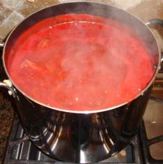 By draining the water off now, you'll end up with a thicker paste in less cooking time! And that preserves vitamins (and your sanity). This is a good time to chop the red peppers!