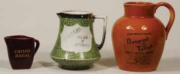 BUSHMILLS 4ins tall, THE SPIRIT OF THE AGE OLD BUSHMILLS, to one side only, Burleigh Ware pm, nice colourful jug, R$175 (250 400) 247.