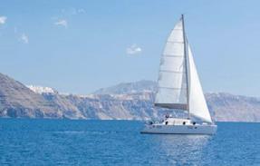 ones during a private catamaran 5-hour morning or sunset cruise along the volcanic Santorinian coastline.