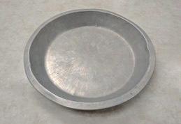 Pie pan, typically used for the baking of pie