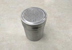 Shaker for dusting pastry or baked goods with light ingredients such as powdered