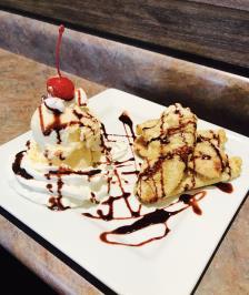 00 Deep-fried cheesecake drizzled with chocolate syrup; served with whipped cream and strawberry sauce FRIED BANANA 5.
