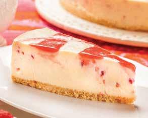 rich white chocolate cheesecake, decorated with a raspberry coulis swirl
