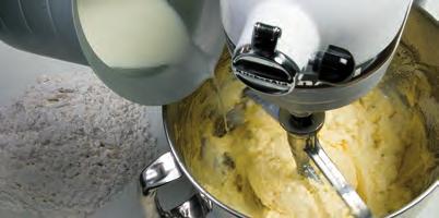 Scrape down the sides of the bowl occasionally for even mixing. The reason for adding dry and liquids alternately is that the batter may not absorb all the liquid unless some of the flour is present.
