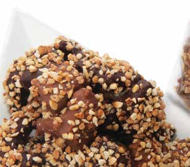 Praline. hazelnut toffee bites Bite size buttery brittle toffee with roasted chopped hazelnuts. Each one is dipped in milk or dark chocolate and sprinkled with caramelized hazelnuts.