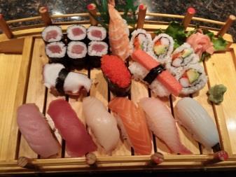 95 Sushi Deluxe* 10 Pieces of nigiri sushi, 4 pieces of a California roll,