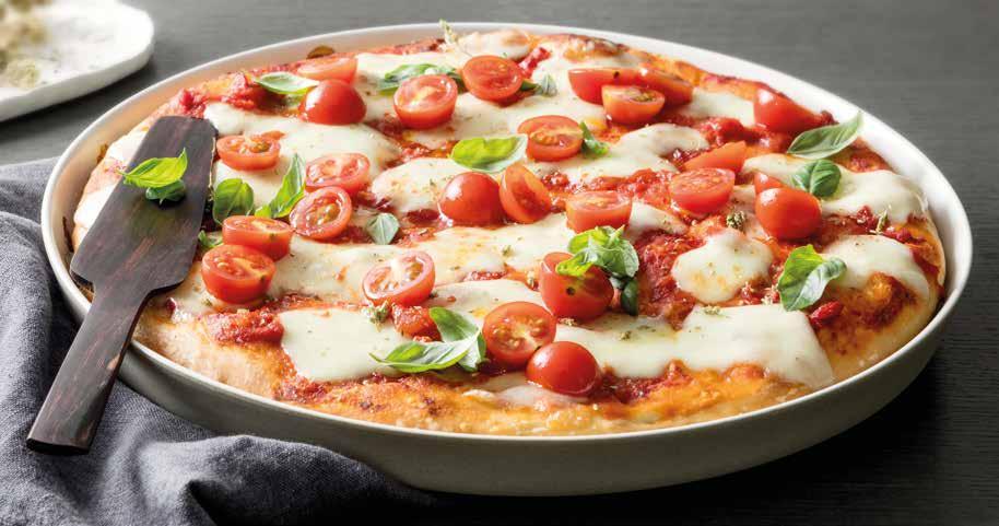 26 PIZZA - PIZZA 2 PANS PREPARATION: 2 hours COOKING TIME*: 25-35 min drip tray or baking tray supplied with oven FOR 1 TRAY 350 g of flour 200 ml of water 18 ml of olive oil 14 g of dry yeast 7 g of