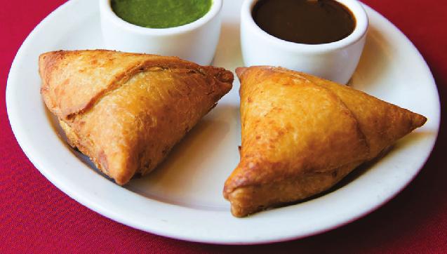 vegetable samosa APPETIZERS Papadum... 2.50 Crispy bread mixed with chickpeas flour Vegetable Samosa... Triangular pastry mixed with mashed potatoes, peas and spices Lamb Samosa... 5.