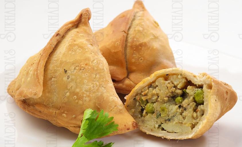 APPETIZERS - $ 5.50 39. Party Samosa - 4pcs 40. Punjabi Samosa - 2pcs (A thin pastry cone made of wheat flour filled with potatoes and green peas) 41. Khaman Dhokla 42.