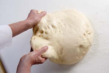 114 CHAPTER 6 UndersTAnding YEAst Doughs Large quantities of dough are more easily folded on a workbench, although small batches can easily be folded in the bowl or container