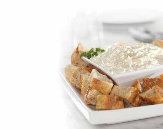ARTICHOKE DIP 1 cup mayonnaise 4-ounce can marinated artichokes (reserve 2 tablespoons liquid) ½ pound low-fat mozzarella cheese, cut in large pieces ½ cup Parmesan cheese, cut in pieces or grated 2
