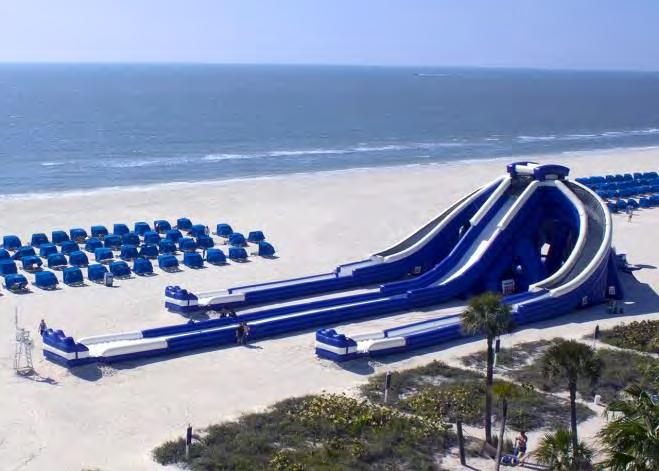 What We Can Do On The Beach The High Tide Slide is a 3-story waterslide on the beach that I can go on.