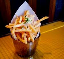 Shoe string fries infused with supreme truffle oil, tossed with a