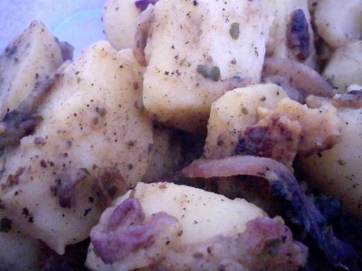 German Potato Salad 9 potatoes, peeled 6 slices bacon 3/4 cup chopped onions 2 tbs all-purpose flour 2 tbs white sugar 2 tsp salt 1/2 tsp celery seed 1/8 tsp ground black pepper 3/4 cup water 1/3 cup