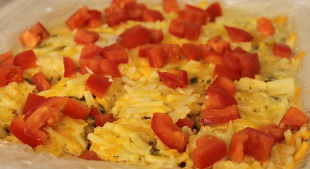 Breakfast Casserole 12 egg beater eggs 1 cup non fat milk 1 large bell pepper diced 1 white onion diced 2 roma tomatoes chopped 2 cups shredded cauliflower 1 cup shredded potato / hash browns ½ cup