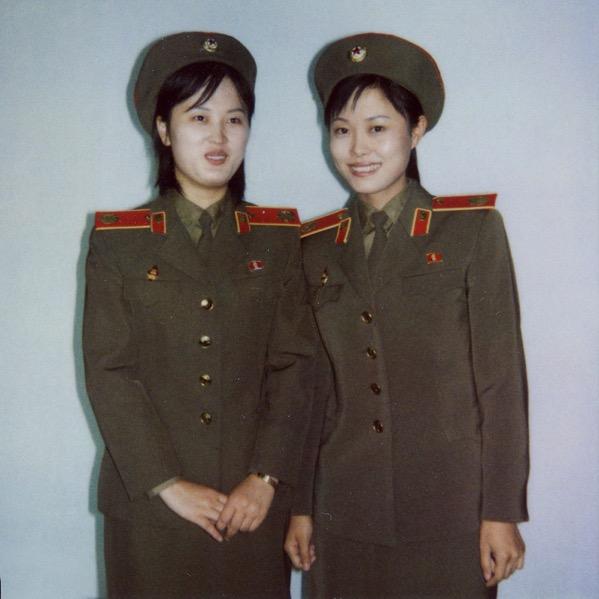 Two North Korean guides in the Victorious Fatherland Liberation War Museum (aka the War Museum) in Pyongyang.