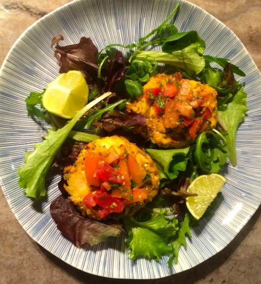 Crab Cakes with Tomato Salsa Crab Cakes 2cm piece fresh root ginger 2 red chilies 350g white crab meat (use fresh or tinned) 1 tbsp coriander 2 Spring onions 1 free-range egg 2 tsp chia seeds 2 tsp