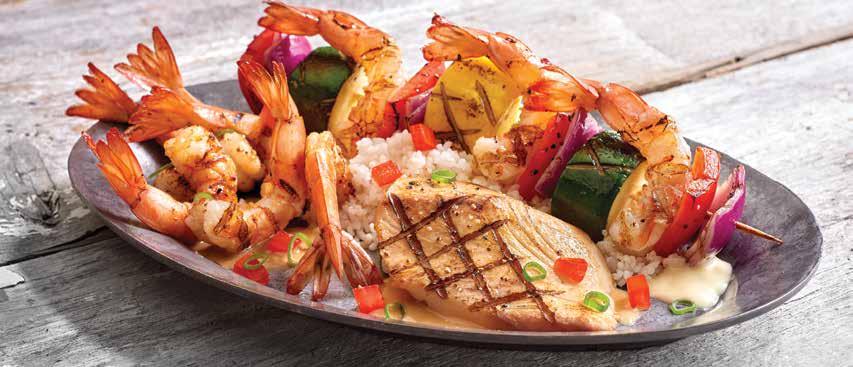 Grilled Seafood Trio Add a Fresh Garden Salad (150 cals) or Tossed Caesar Salad (400 cals) for 5.89 or a Skewer of Chargrilled Shrimp (150 cals) for 5.