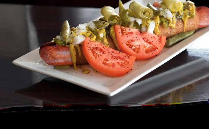 Chicago Style Hot Dog HOT DOGS CHICAGO STYLE Topped with yellow mustard, onion, sweet relish, tomato, dill pickle, sport pepper, celery salt & poppy seeds 9.