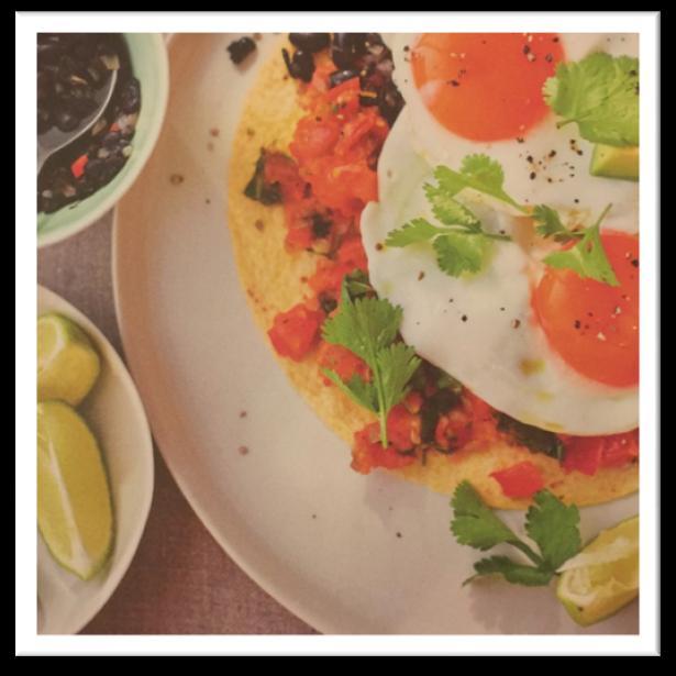 HEUVOS RANCHEROS Serves 2 Ingredients: 2 wholemeal tortillas 2 tbsp olive oil 4 ripe tomatoes, cut into cubes 3 spring onions, finely chopped 2 green chillies, deseeded for less heat if preferred,