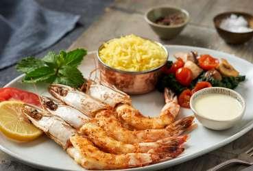 Grilled Shrimps Tenderloin Steak with Mushroom Sauce SEAFOOD 103 فيليه هامور مقلي / Fillet Fried Hammour Breaded & fried hammour fillet, served with coleslaw & french fries 103 فيليه هامور