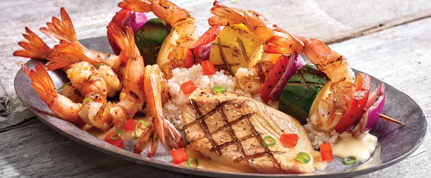 Grilled Seafood Trio Add a Fresh Garden Salad (150 cals) or Tossed Caesar Salad (400 cals) for 5.99 or a Skewer of Chargrilled Shrimp (150 cals) for 5.