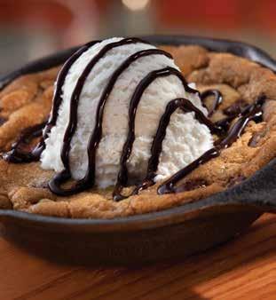 50 Skillet Chocolate Chip Cookie Topped with vanilla ice cream, hot fudge. 6.