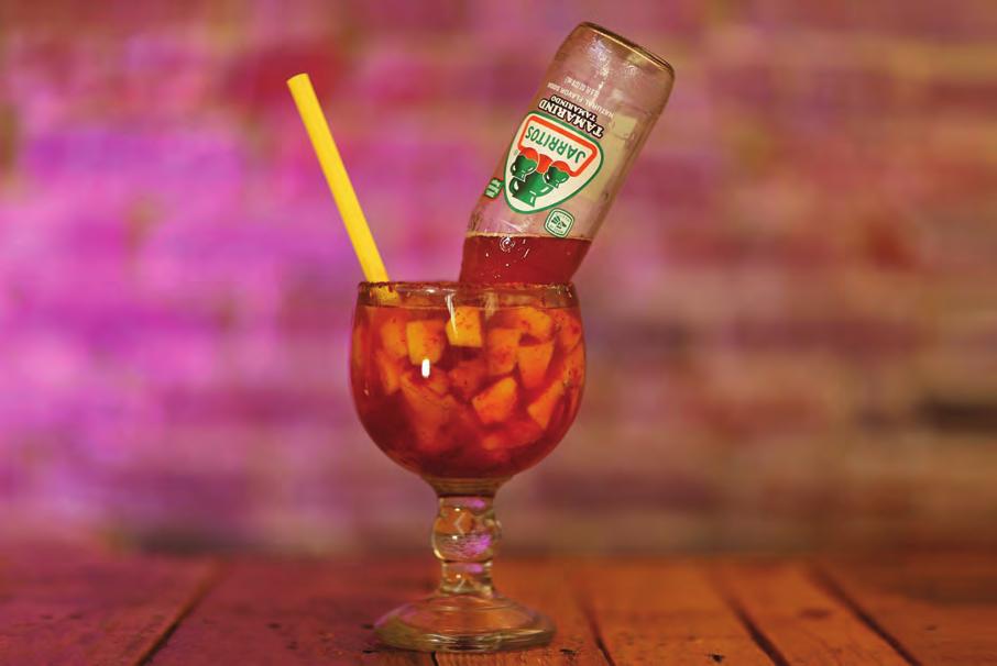 JARRILOCO TM 1 Cup of mango pieces ½ oz of chamoy 1 Cup of ice 1 Jarritos Tamarind 1 Spoon of chili powder ½ Piece of lime Wet rim of glass with lime and add chili powder to rim.
