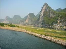 Geography of China The great river picks up and carries a large amount of yellow silt, dissolved in the water.