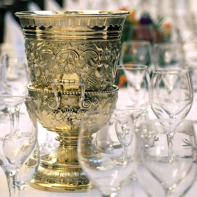 Those taking the Loving Cup stand up and bow to their neighbour who removes the cover with his right hand and holds it while the other drinks.