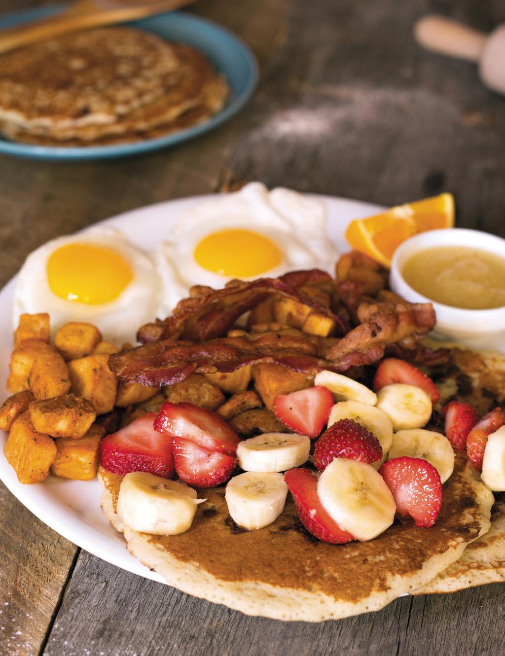 NEW ITEM DOUBLE BLACK JACK 2 Eggs and bacon served with two chocolate chip pancakes topped with bananas