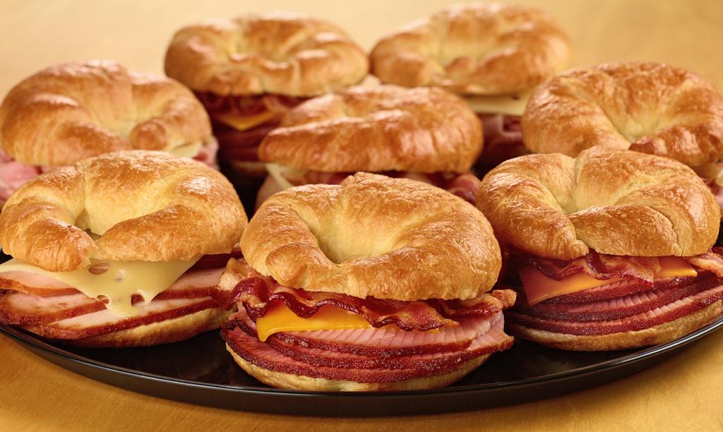 29 pp Smoked Turkey, Egg & Cheddar Bacon, Egg & Cheddar Honey Baked Ham, Bacon, Egg & Cheddar Each tray serves 12 Breakfast Pastry Tray An assortment of breakfast favorites including our Orange Rolls