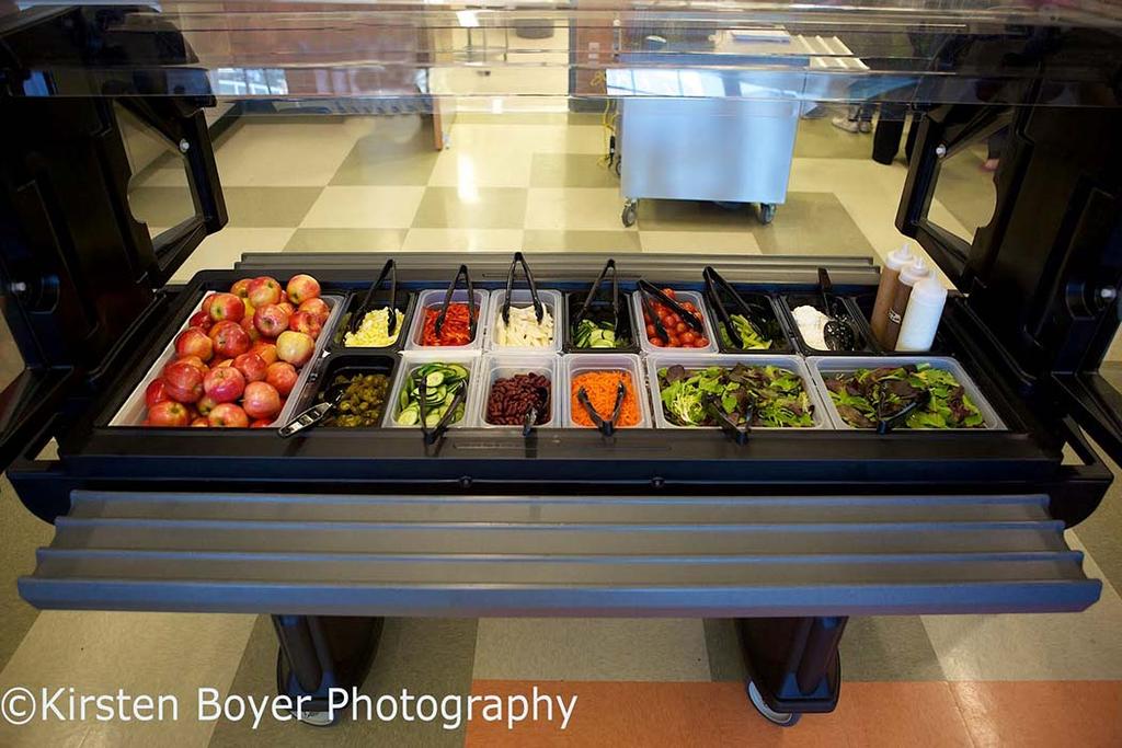 The bars can also multi-task for other meal periods for example being placed in hallways for Grab n Go breakfast pick up. Figure 2. Mobile insulated food bar Pros: Fully mobile. Inexpensive.