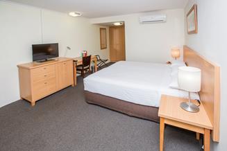 Accommodation Standard Room Featuring either one queen bed or two single beds with an ensuite bathroom, mini-fridge, air conditioning, electronic door locks, tea and coffee making facilities and free