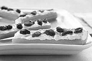 Ants on a Log Makes 2 servings 1 celery stalk 2 tablespoons peanut butter 1 tablespoon raisins Clean