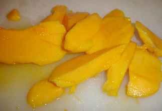 Step 6 - Cut up the mangoes Cut out any brown spots and mushy areas.