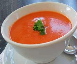 Hot Tomato Soup 2 servings 3 large garlic cloves 3 oz shallots, peeled sliced 1 tablespoon olive oil 1 (14 1/2-ounce) can stewed tomatoes, undrained 1 1/2 cups chicken broth 1/2 teaspoon chili powder