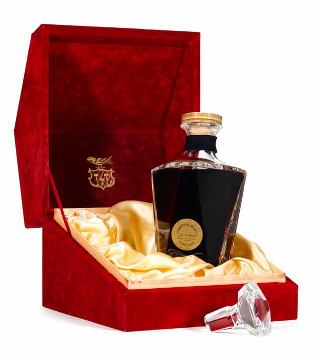 COGNAC & RARE SPIRITS (lots 936-987) 936 Martell Cordon Bleu Cognac. PC. Baccarat crystal decanter. Stopper cork with accompanying crystal stopper. Level: Top shoulder.