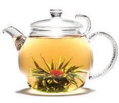 00 MINI FLOWERING TEA BLUEBERRY Featuring a centrepiece of marigold and jasmine flower wrapped in green tea